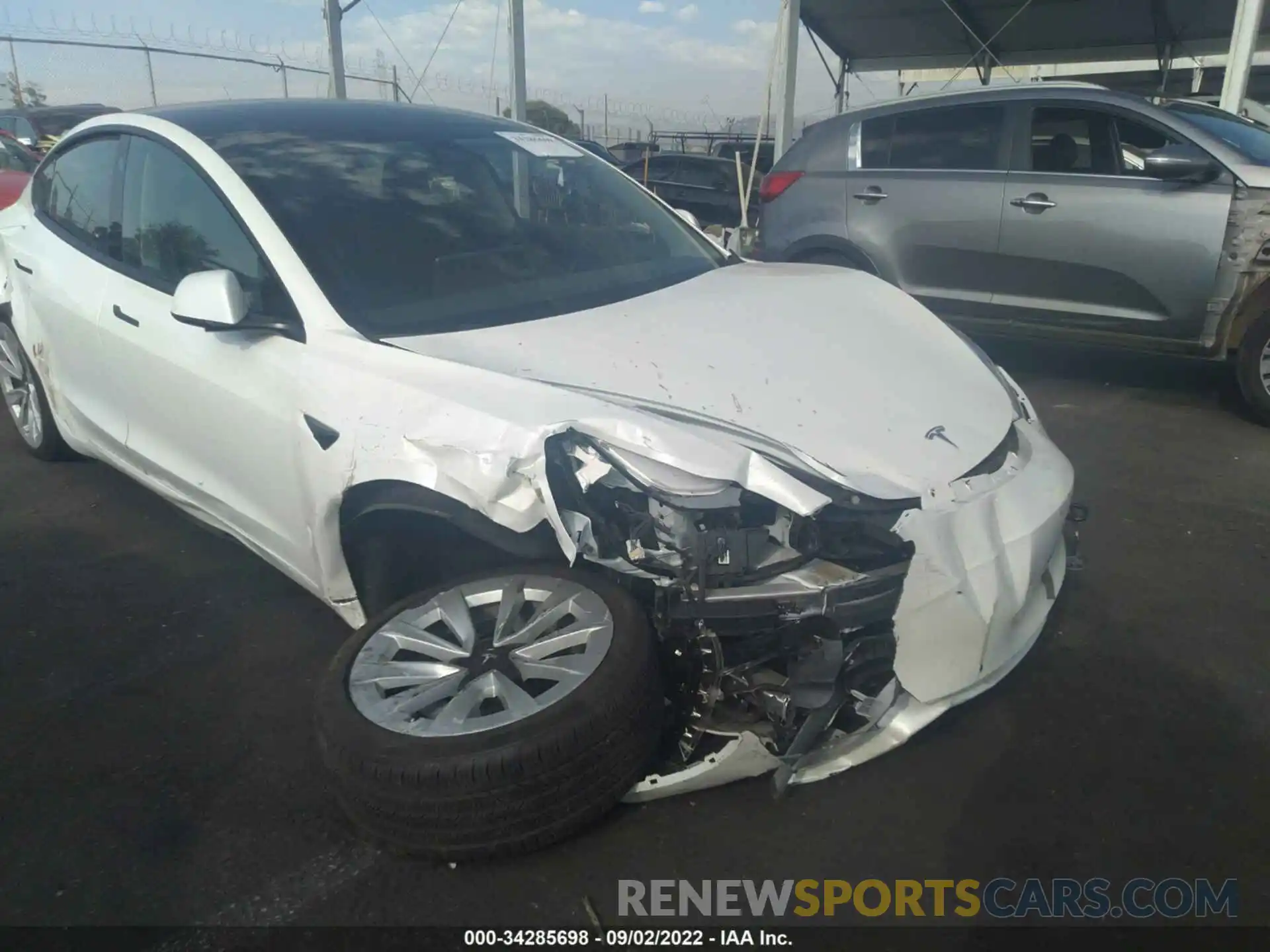 6 Photograph of a damaged car 5YJ3E1EB7MF936817 TESLA MODEL 3 2021