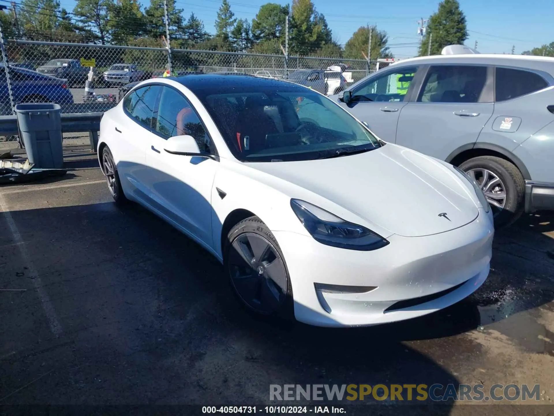 1 Photograph of a damaged car 5YJ3E1EB7MF974757 TESLA MODEL 3 2021