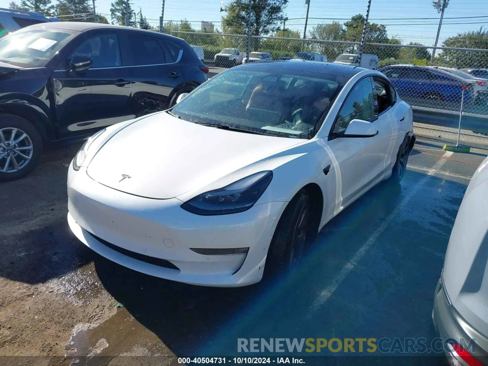 2 Photograph of a damaged car 5YJ3E1EB7MF974757 TESLA MODEL 3 2021