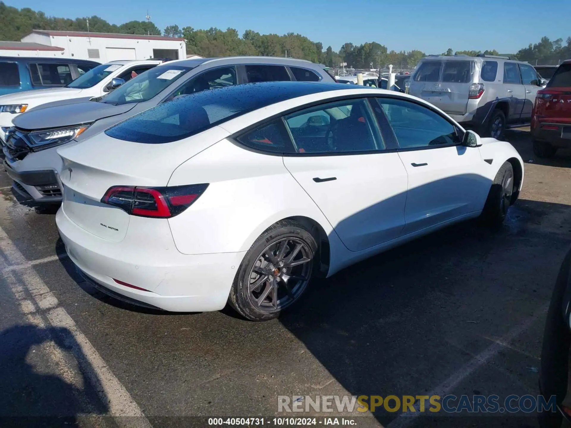4 Photograph of a damaged car 5YJ3E1EB7MF974757 TESLA MODEL 3 2021