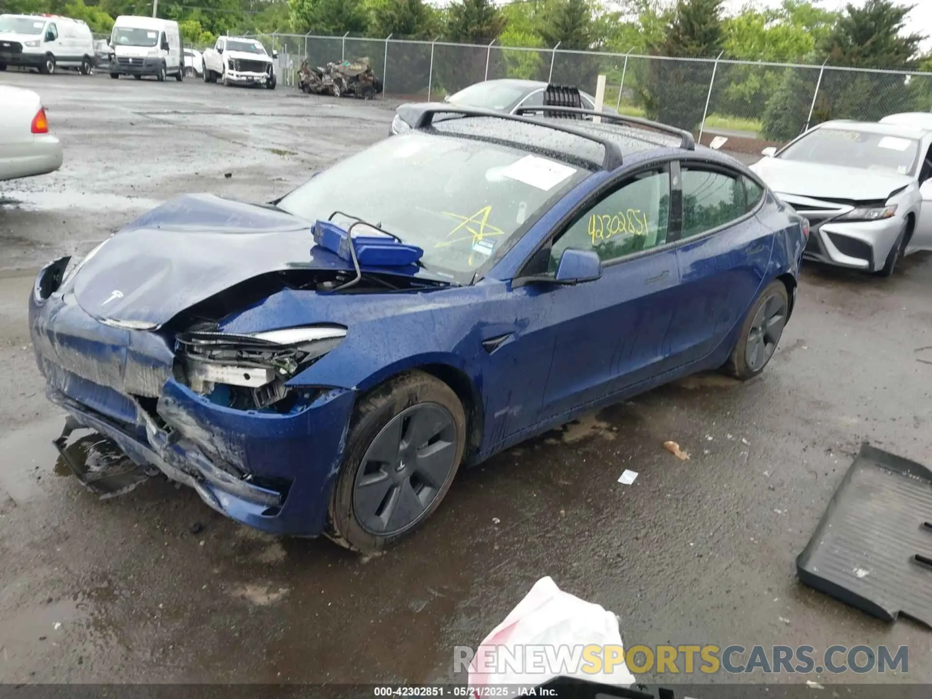 2 Photograph of a damaged car 5YJ3E1EB7MF979876 TESLA MODEL 3 2021