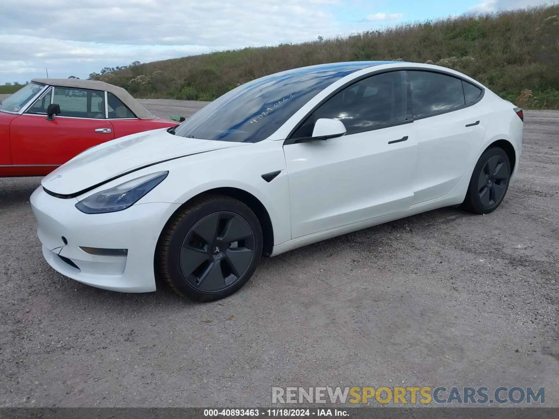 2 Photograph of a damaged car 5YJ3E1EB7MF979988 TESLA MODEL 3 2021