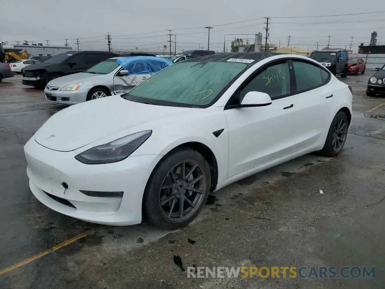 2 Photograph of a damaged car 5YJ3E1EB8MF010037 TESLA MODEL 3 2021