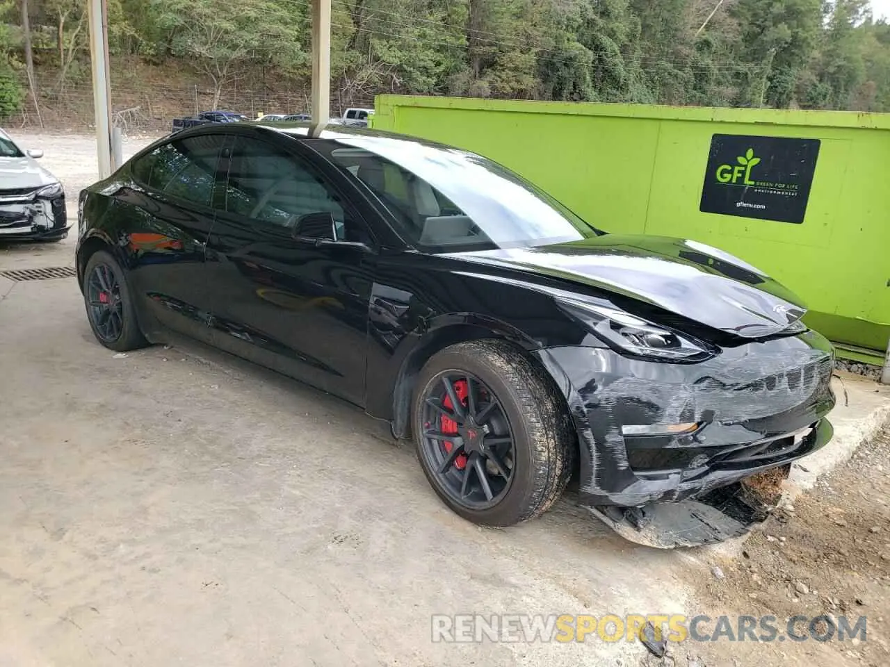 4 Photograph of a damaged car 5YJ3E1EB8MF067399 TESLA MODEL 3 2021