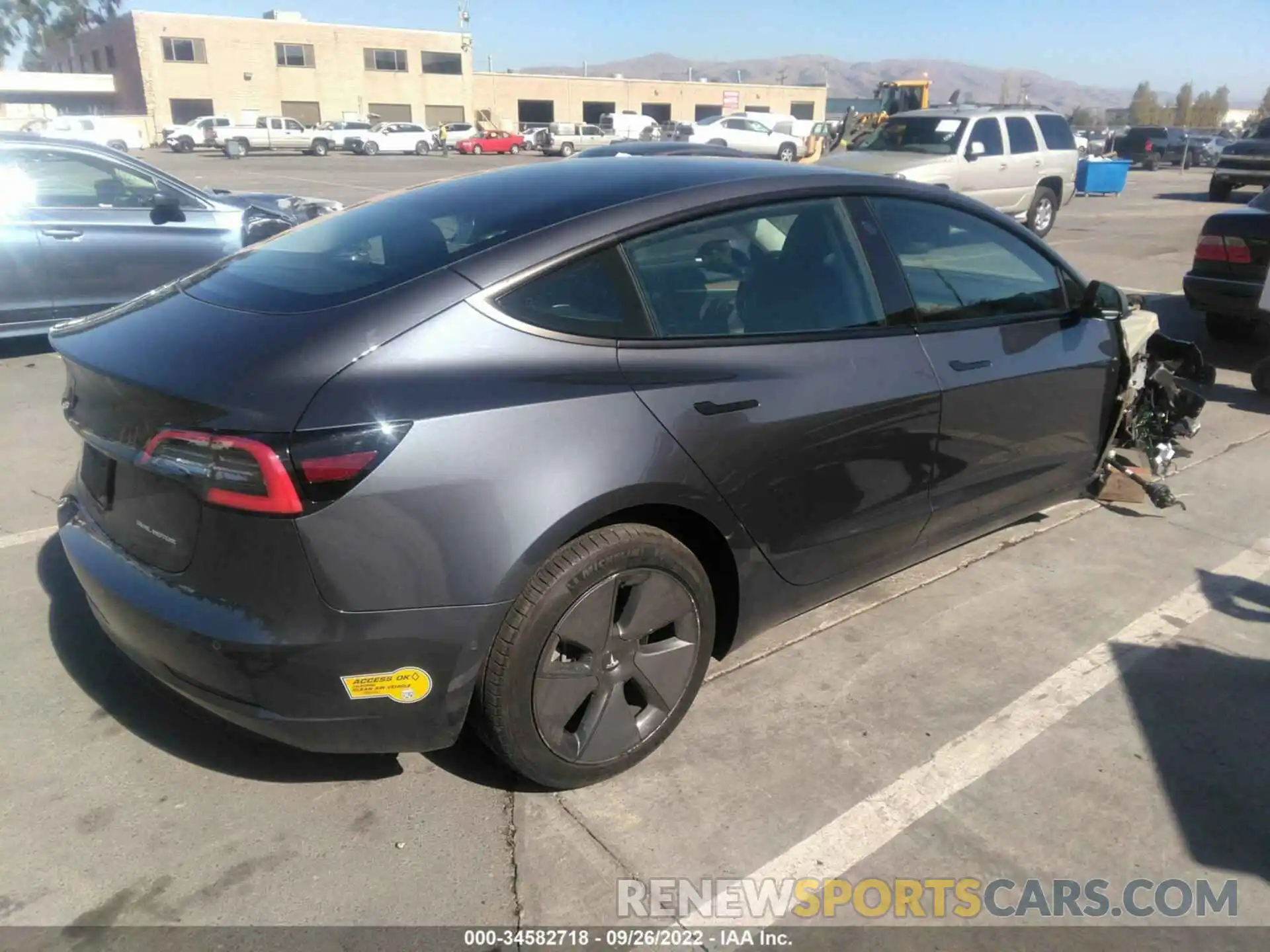 4 Photograph of a damaged car 5YJ3E1EB8MF077110 TESLA MODEL 3 2021