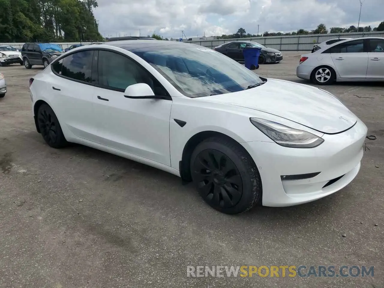 4 Photograph of a damaged car 5YJ3E1EB8MF856040 TESLA MODEL 3 2021