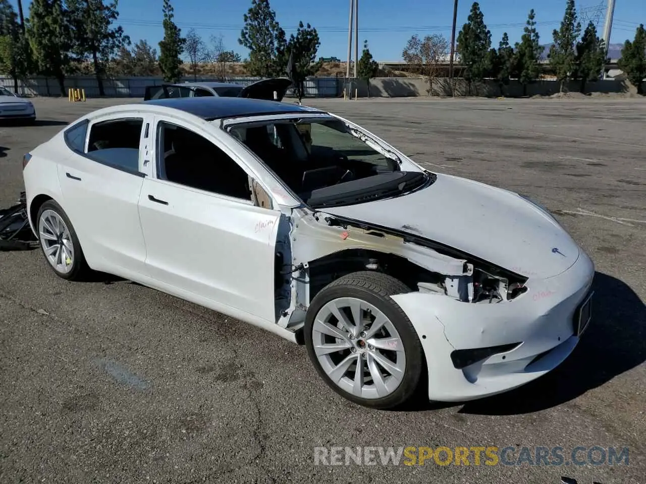 4 Photograph of a damaged car 5YJ3E1EB8MF872884 TESLA MODEL 3 2021