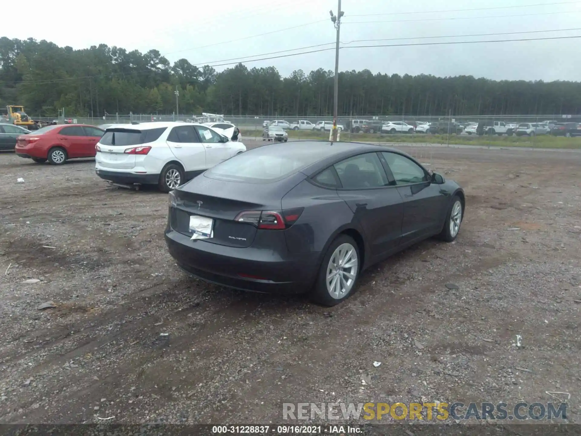 4 Photograph of a damaged car 5YJ3E1EB8MF960821 TESLA MODEL 3 2021