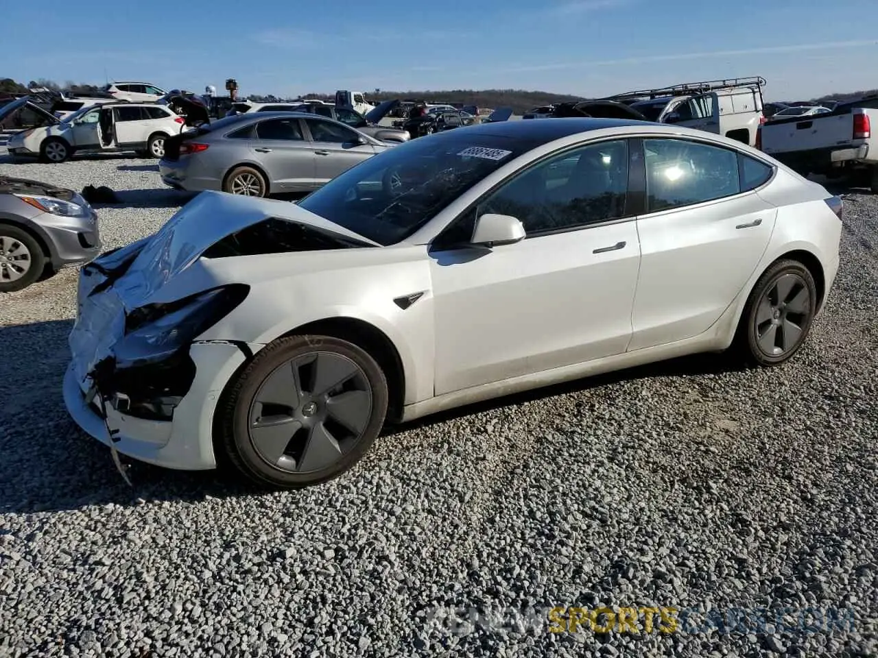 1 Photograph of a damaged car 5YJ3E1EB8MF979997 TESLA MODEL 3 2021