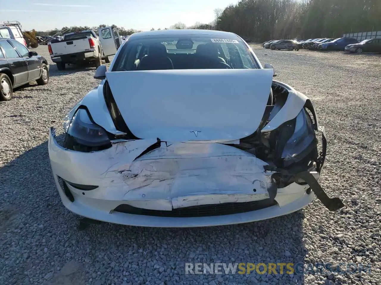5 Photograph of a damaged car 5YJ3E1EB8MF979997 TESLA MODEL 3 2021