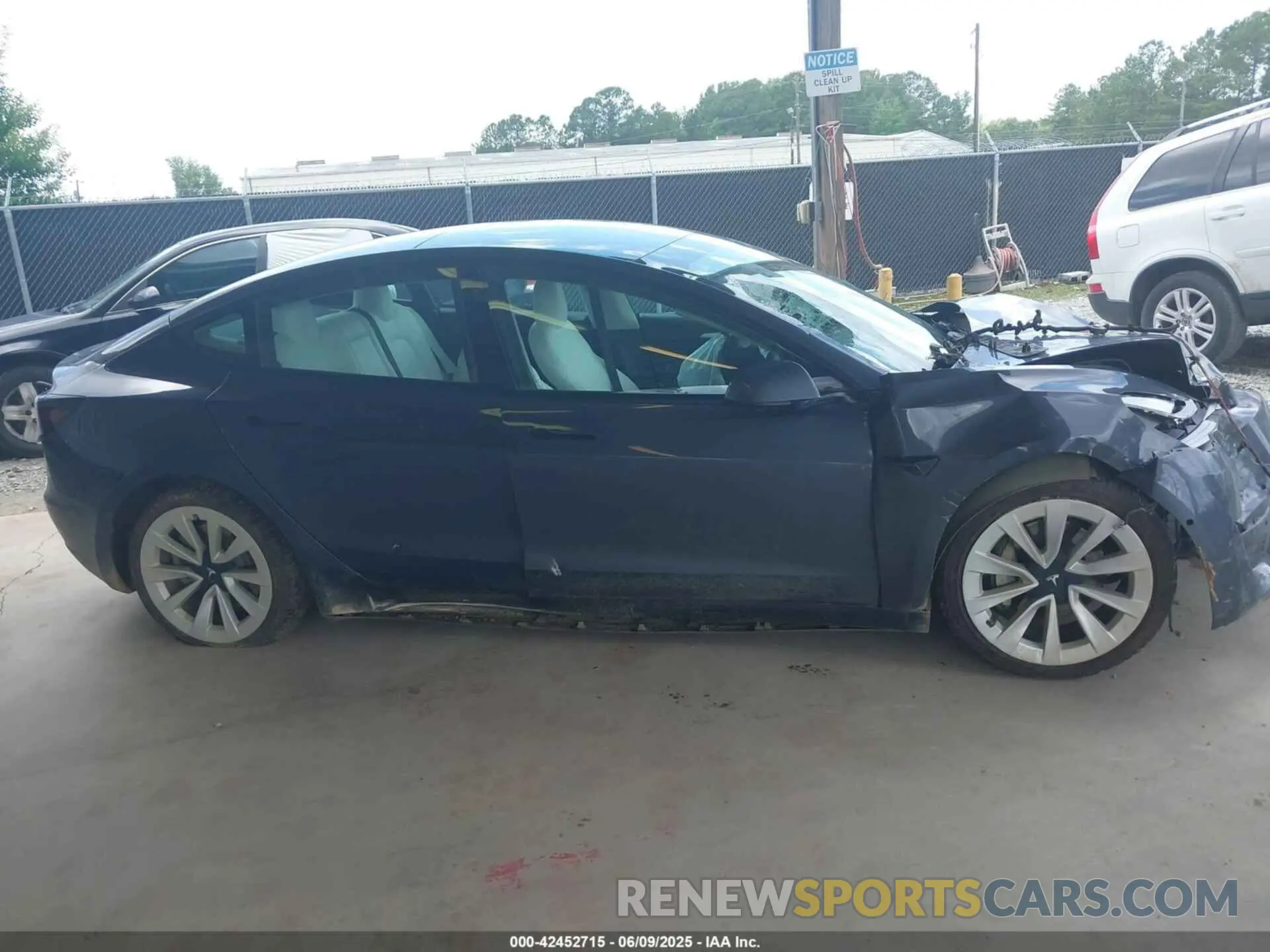 12 Photograph of a damaged car 5YJ3E1EB8MF980681 TESLA MODEL 3 2021