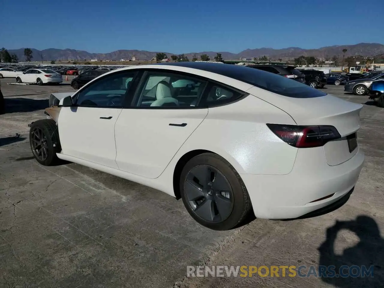 2 Photograph of a damaged car 5YJ3E1EB9MF001010 TESLA MODEL 3 2021