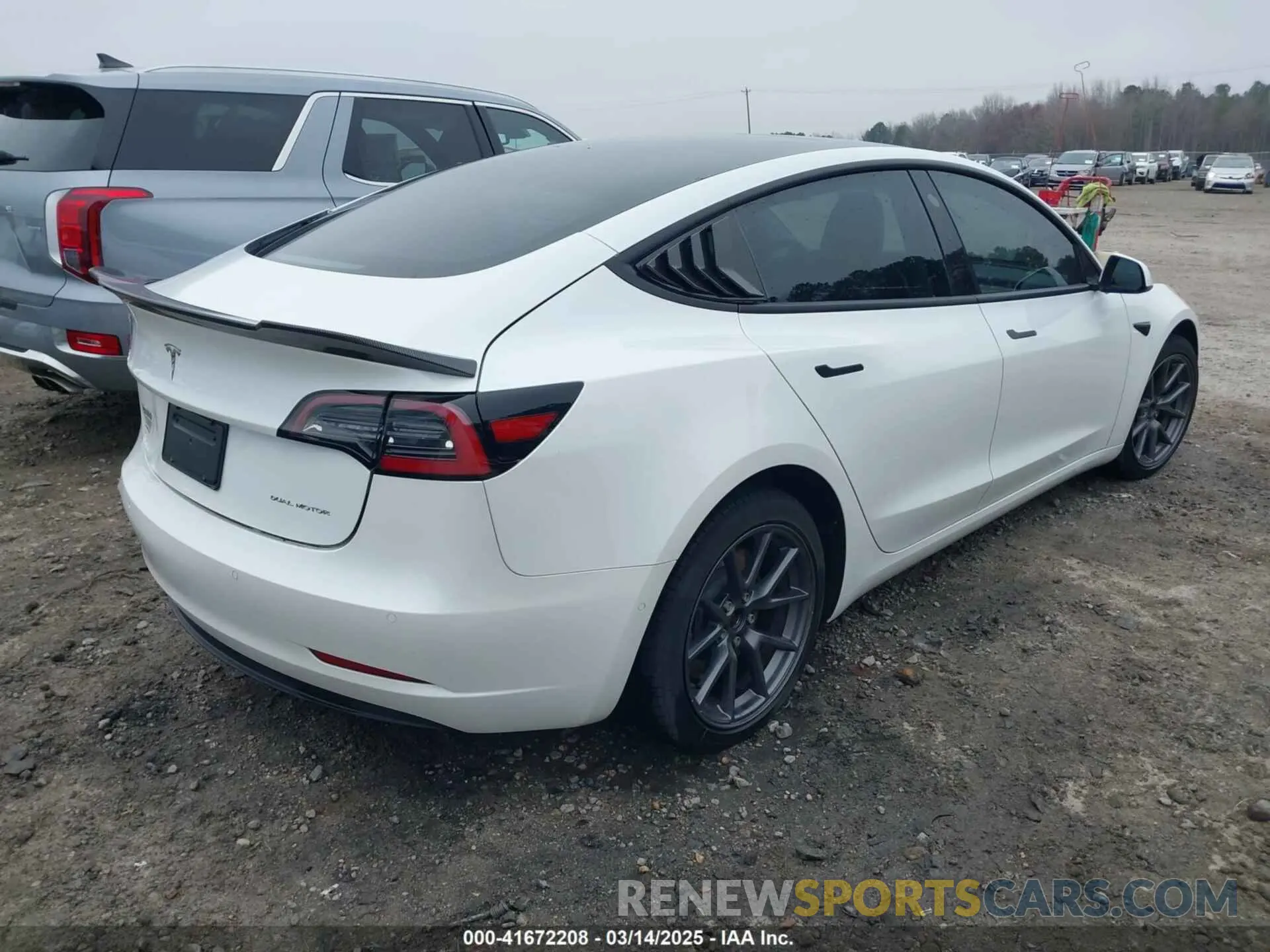 4 Photograph of a damaged car 5YJ3E1EB9MF014985 TESLA MODEL 3 2021
