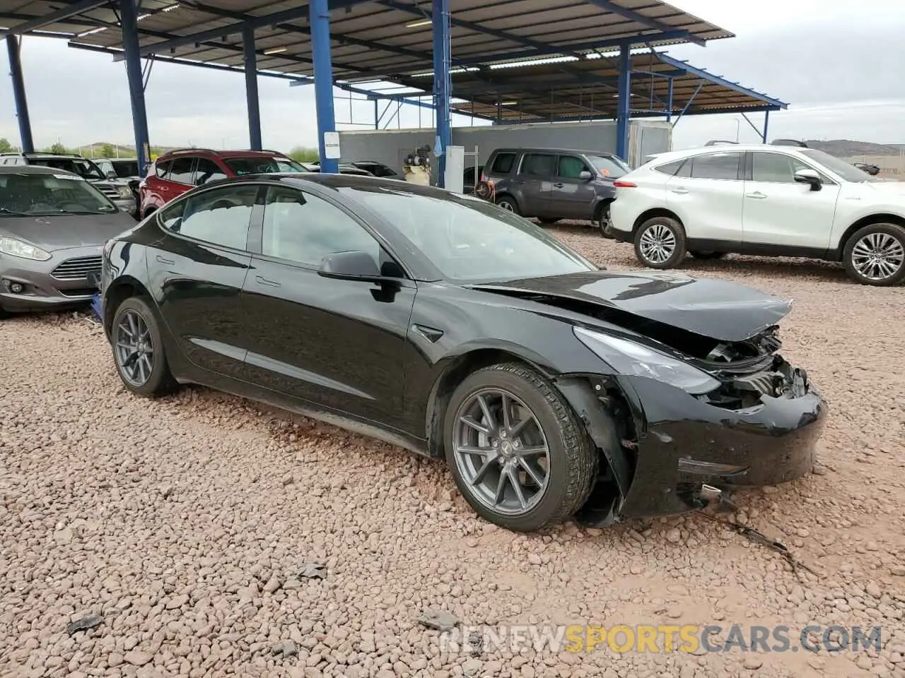 4 Photograph of a damaged car 5YJ3E1EB9MF032810 TESLA MODEL 3 2021