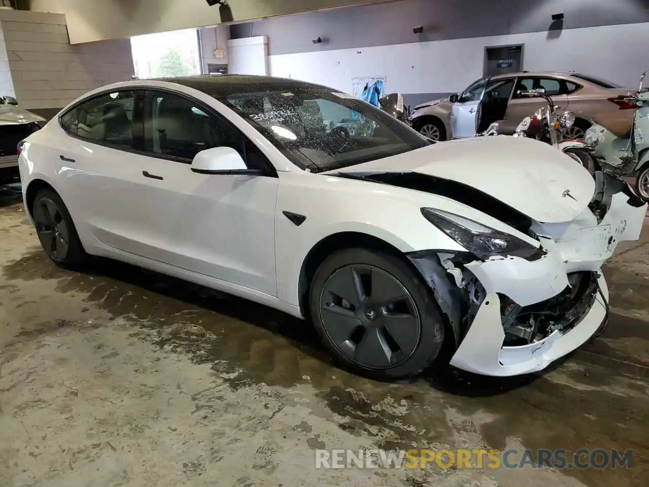 4 Photograph of a damaged car 5YJ3E1EB9MF034847 TESLA MODEL 3 2021