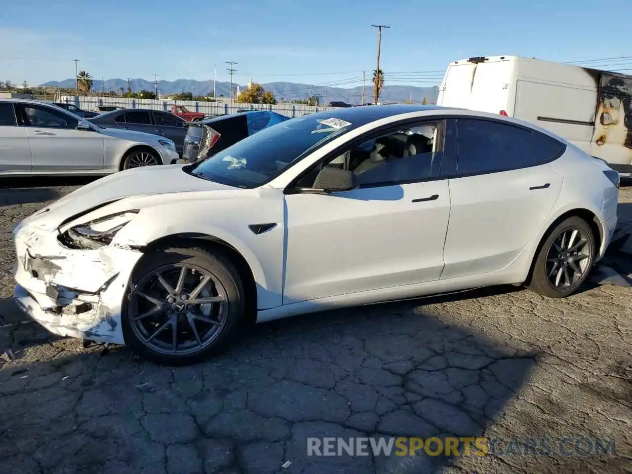 1 Photograph of a damaged car 5YJ3E1EB9MF060963 TESLA MODEL 3 2021