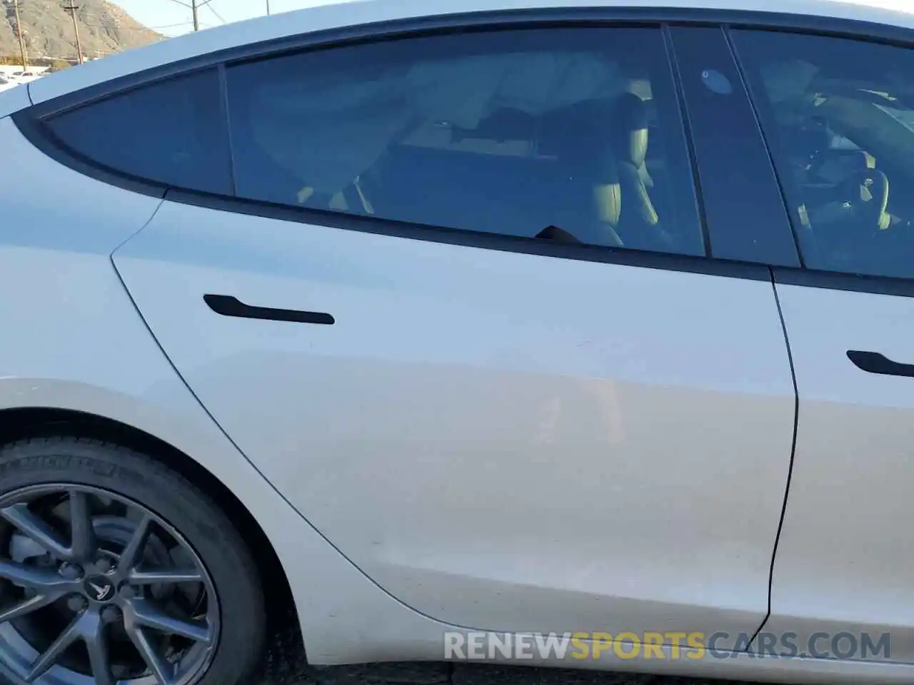 10 Photograph of a damaged car 5YJ3E1EB9MF060963 TESLA MODEL 3 2021