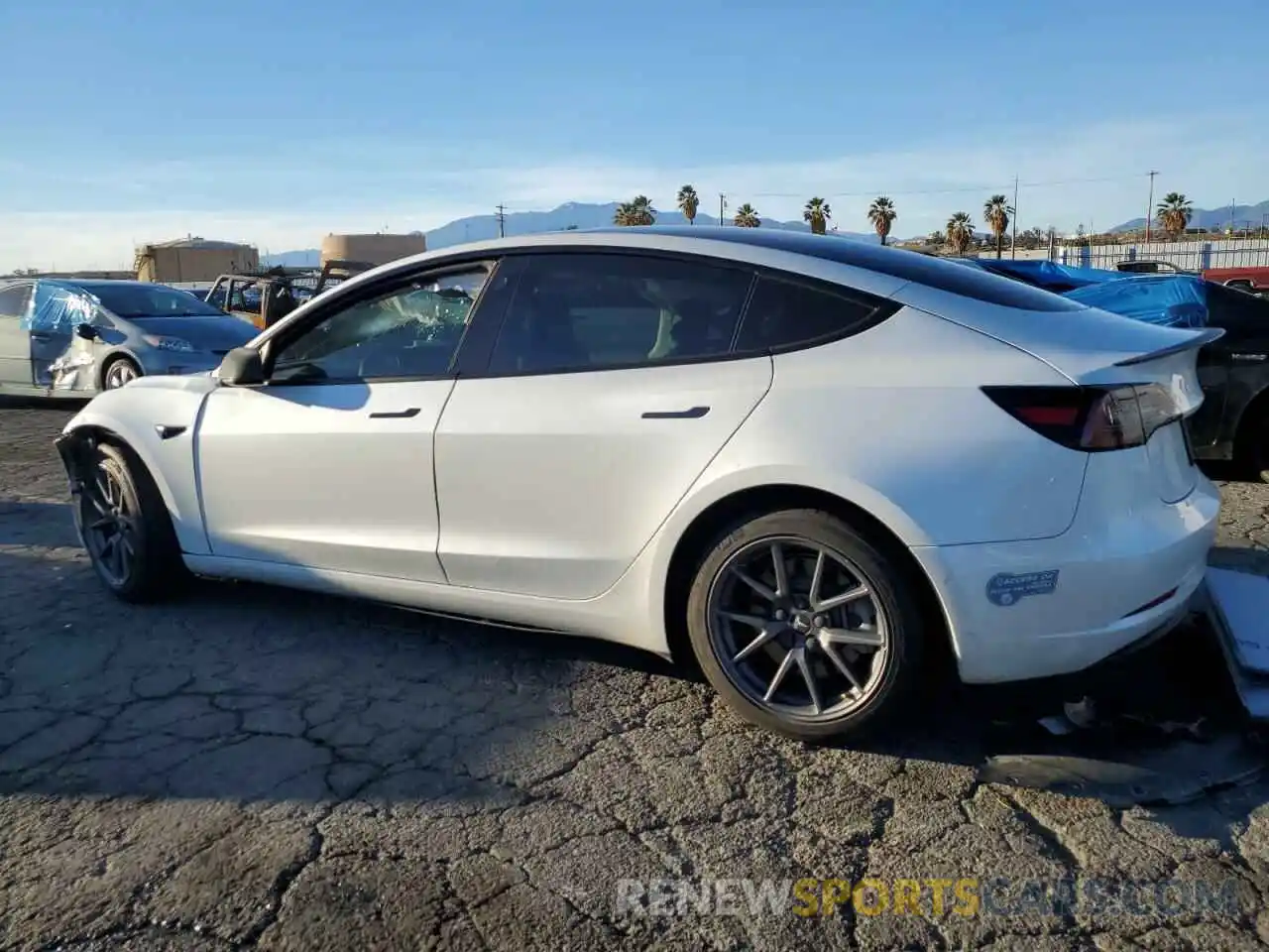 2 Photograph of a damaged car 5YJ3E1EB9MF060963 TESLA MODEL 3 2021