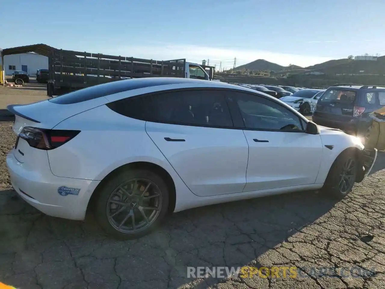 3 Photograph of a damaged car 5YJ3E1EB9MF060963 TESLA MODEL 3 2021