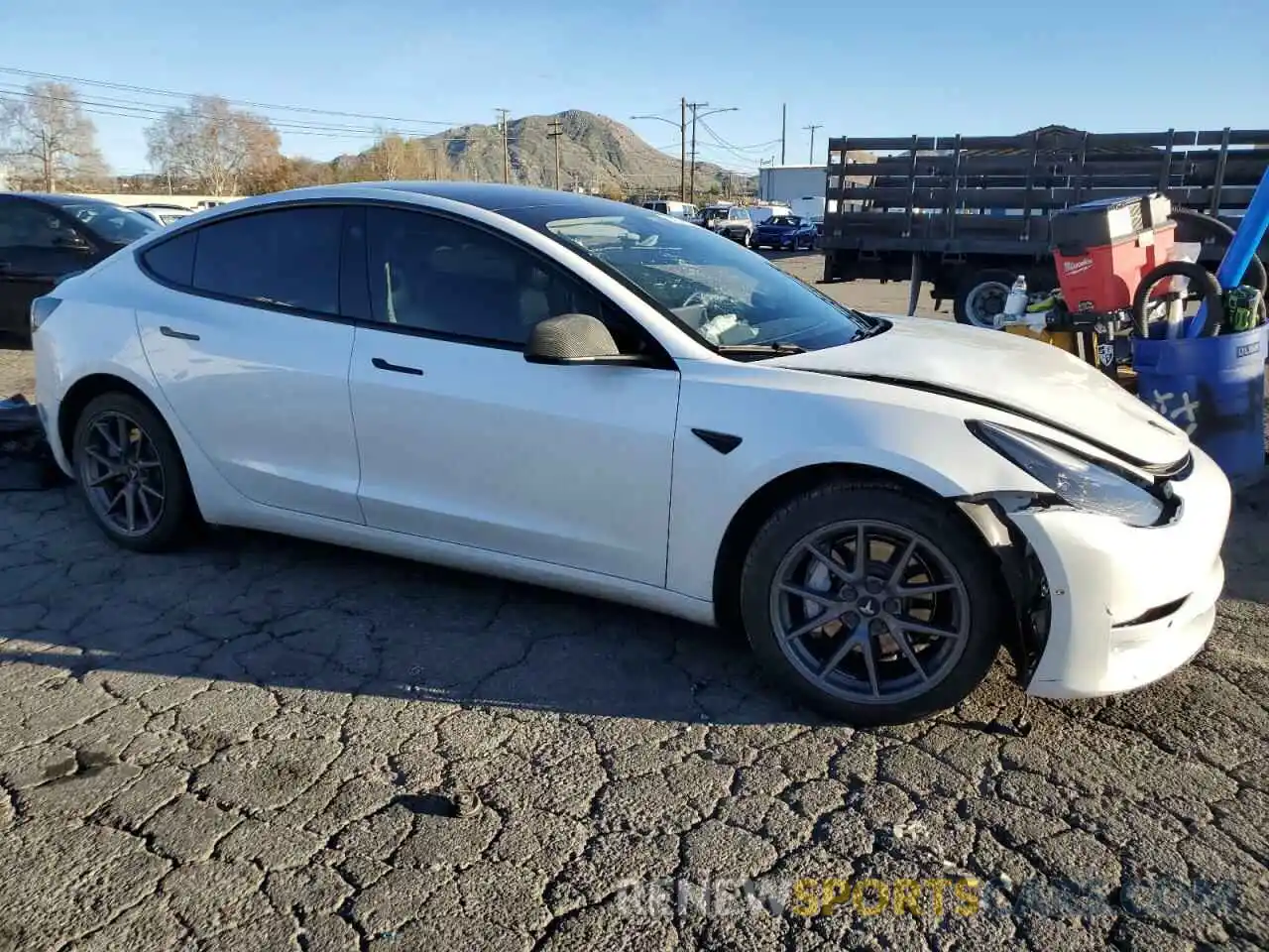 4 Photograph of a damaged car 5YJ3E1EB9MF060963 TESLA MODEL 3 2021