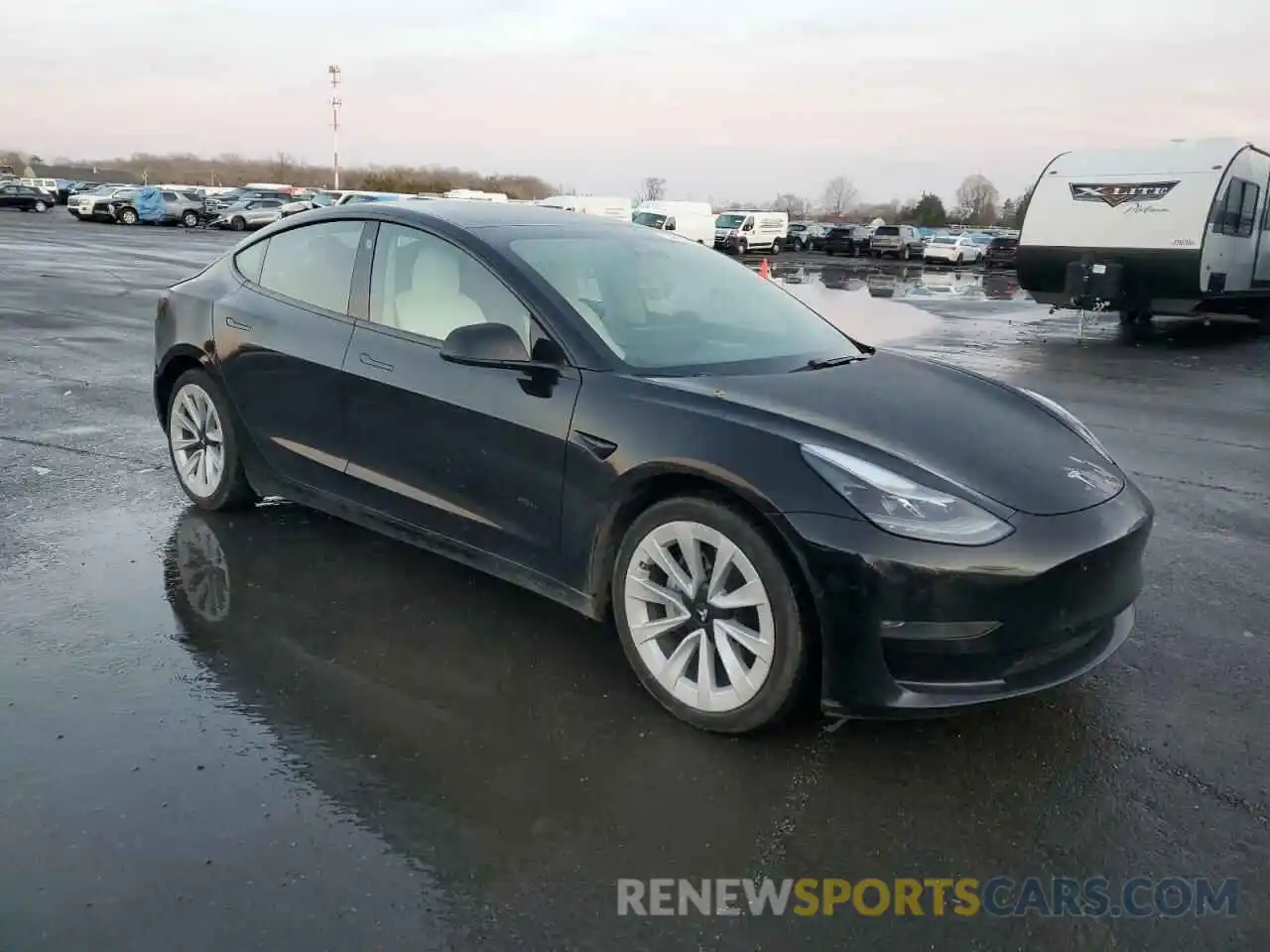 4 Photograph of a damaged car 5YJ3E1EB9MF066357 TESLA MODEL 3 2021