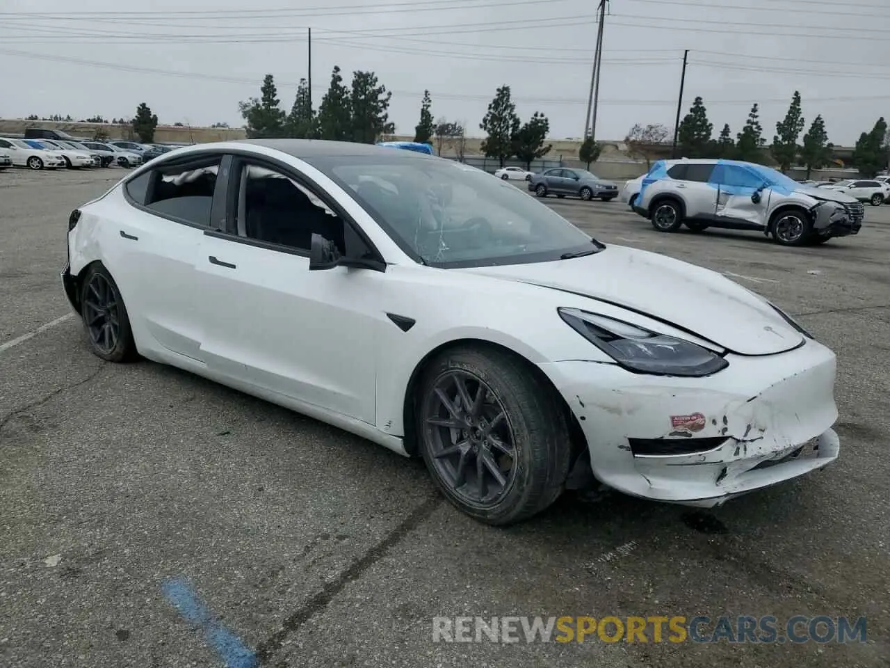 4 Photograph of a damaged car 5YJ3E1EB9MF070246 TESLA MODEL 3 2021