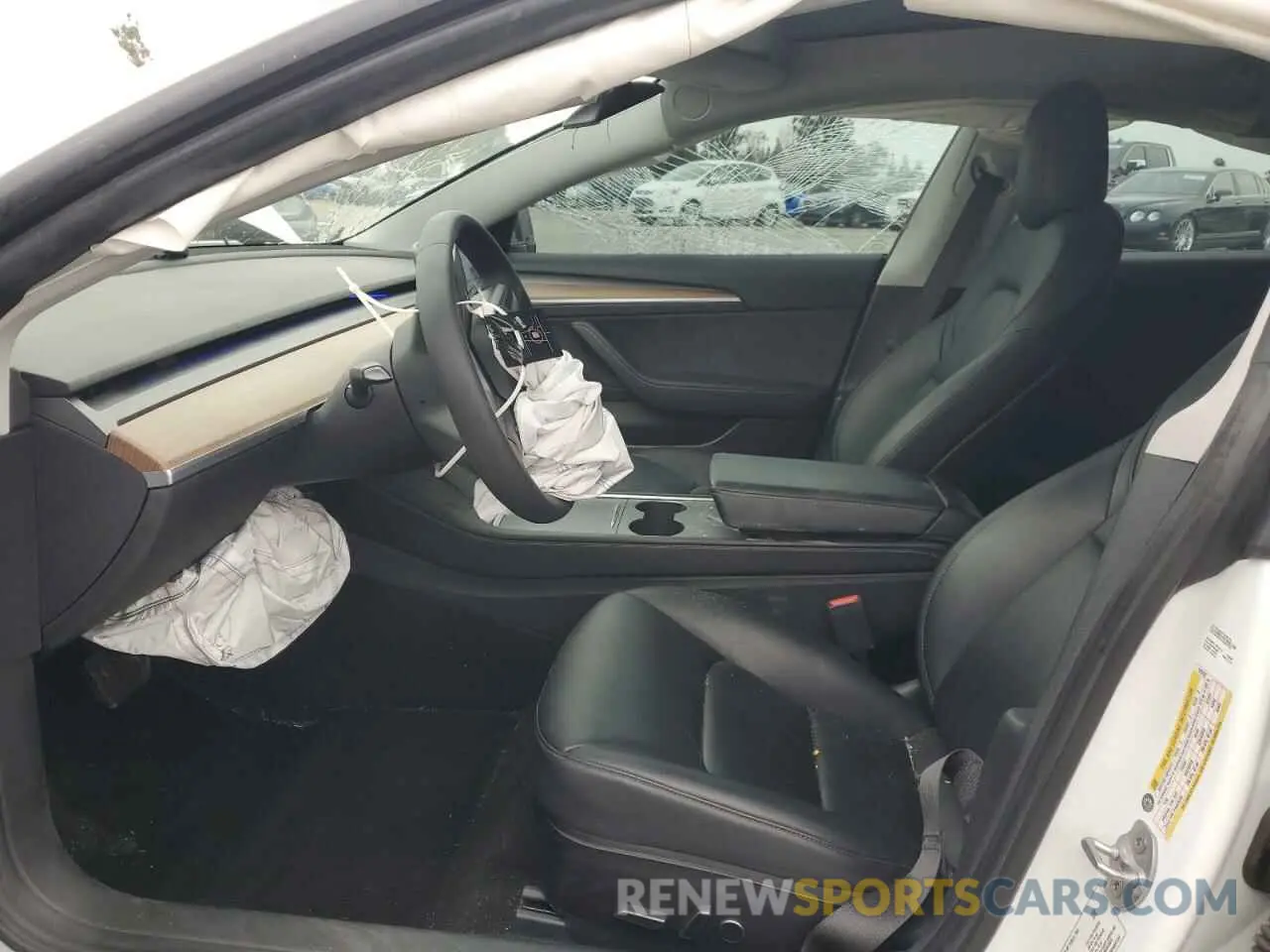 7 Photograph of a damaged car 5YJ3E1EB9MF070246 TESLA MODEL 3 2021