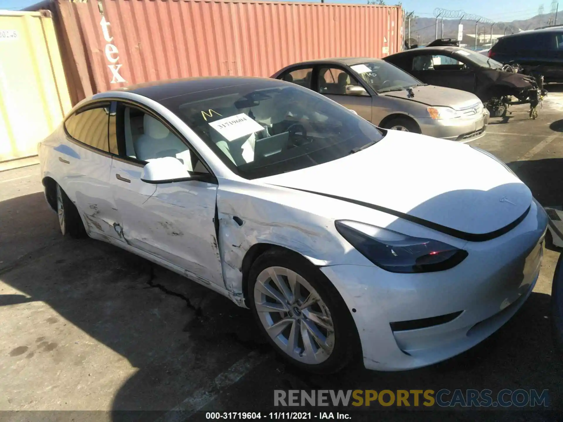 1 Photograph of a damaged car 5YJ3E1EB9MF078847 TESLA MODEL 3 2021