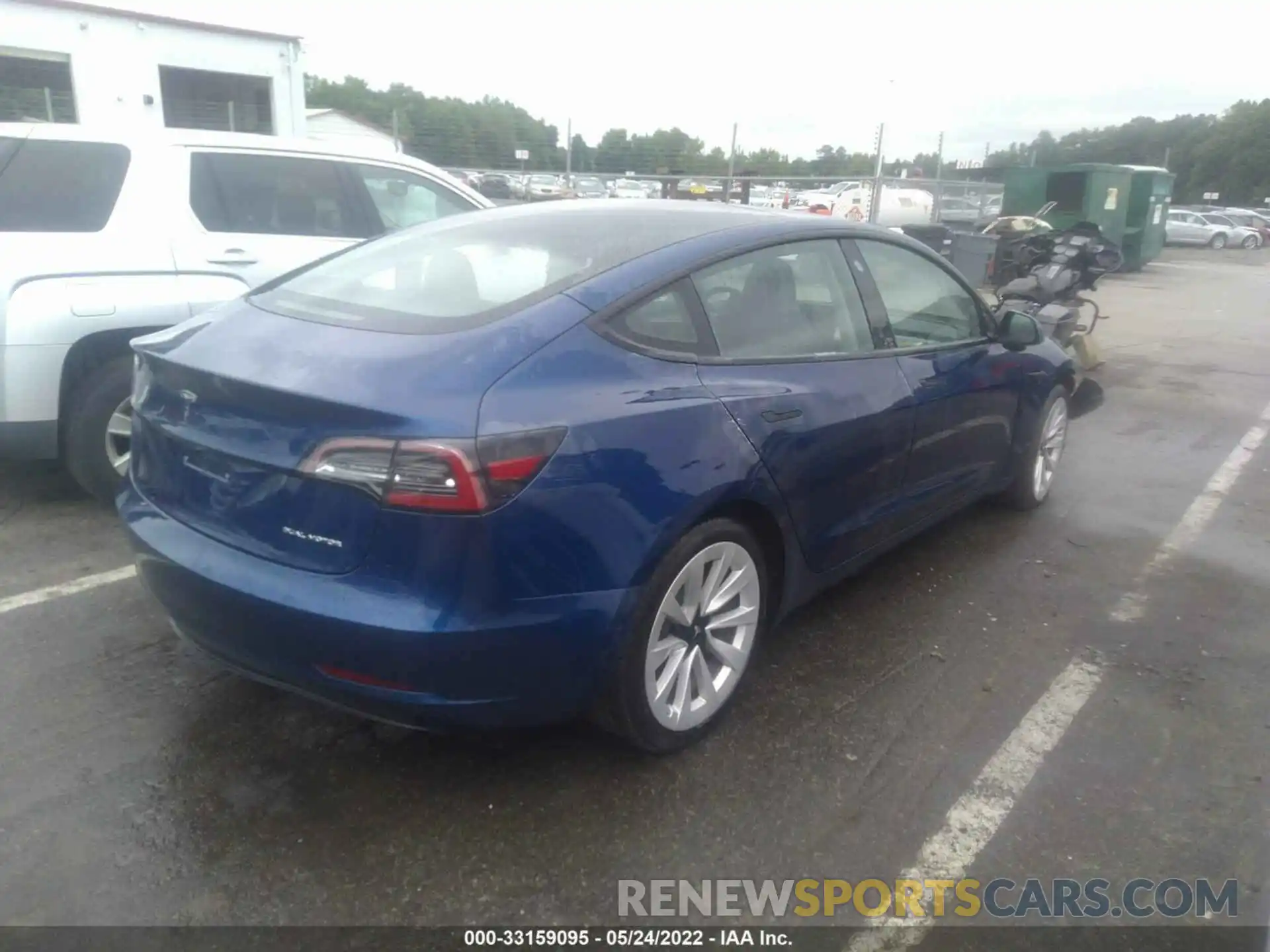 4 Photograph of a damaged car 5YJ3E1EB9MF079898 TESLA MODEL 3 2021