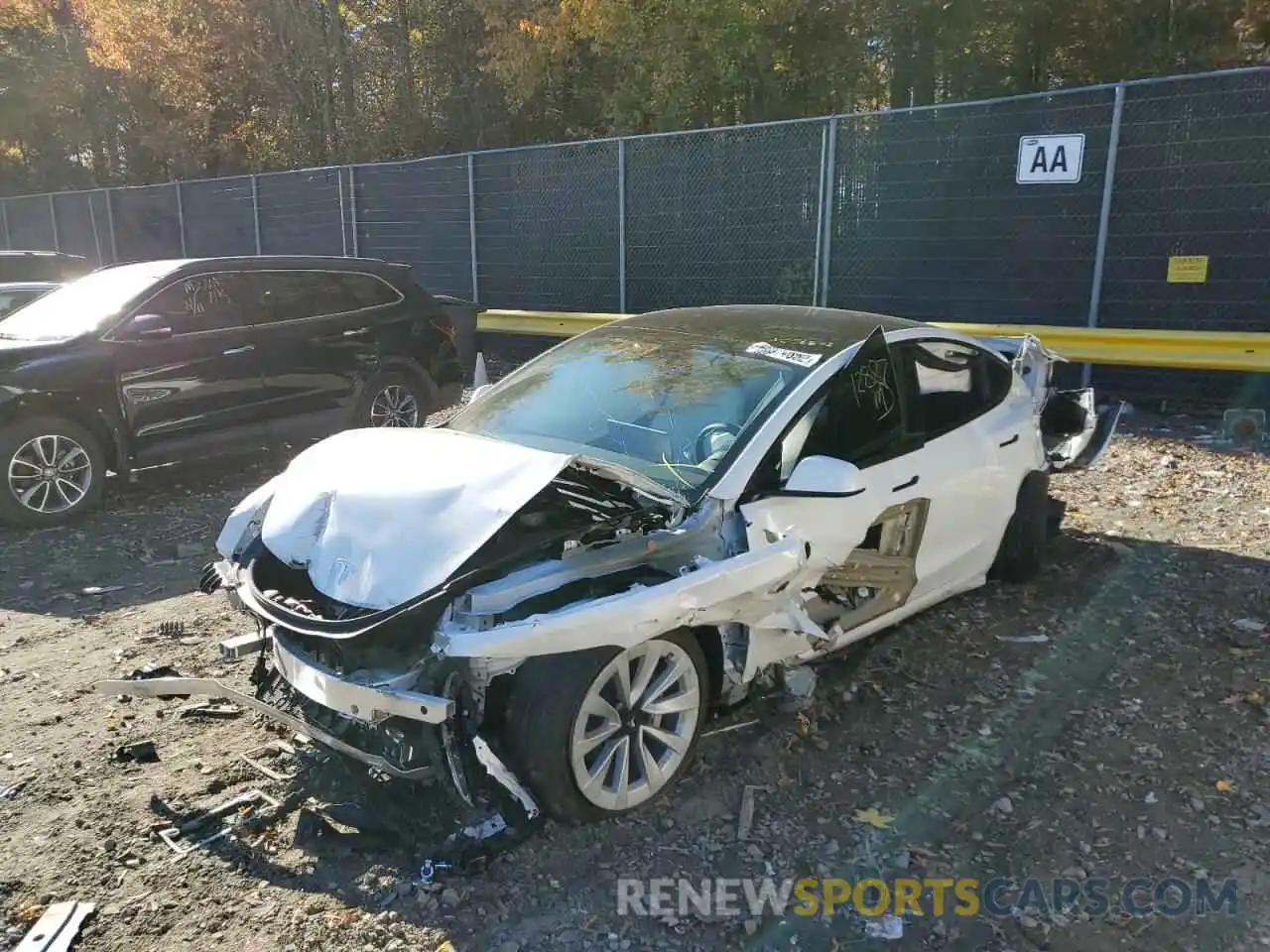 2 Photograph of a damaged car 5YJ3E1EB9MF083806 TESLA MODEL 3 2021