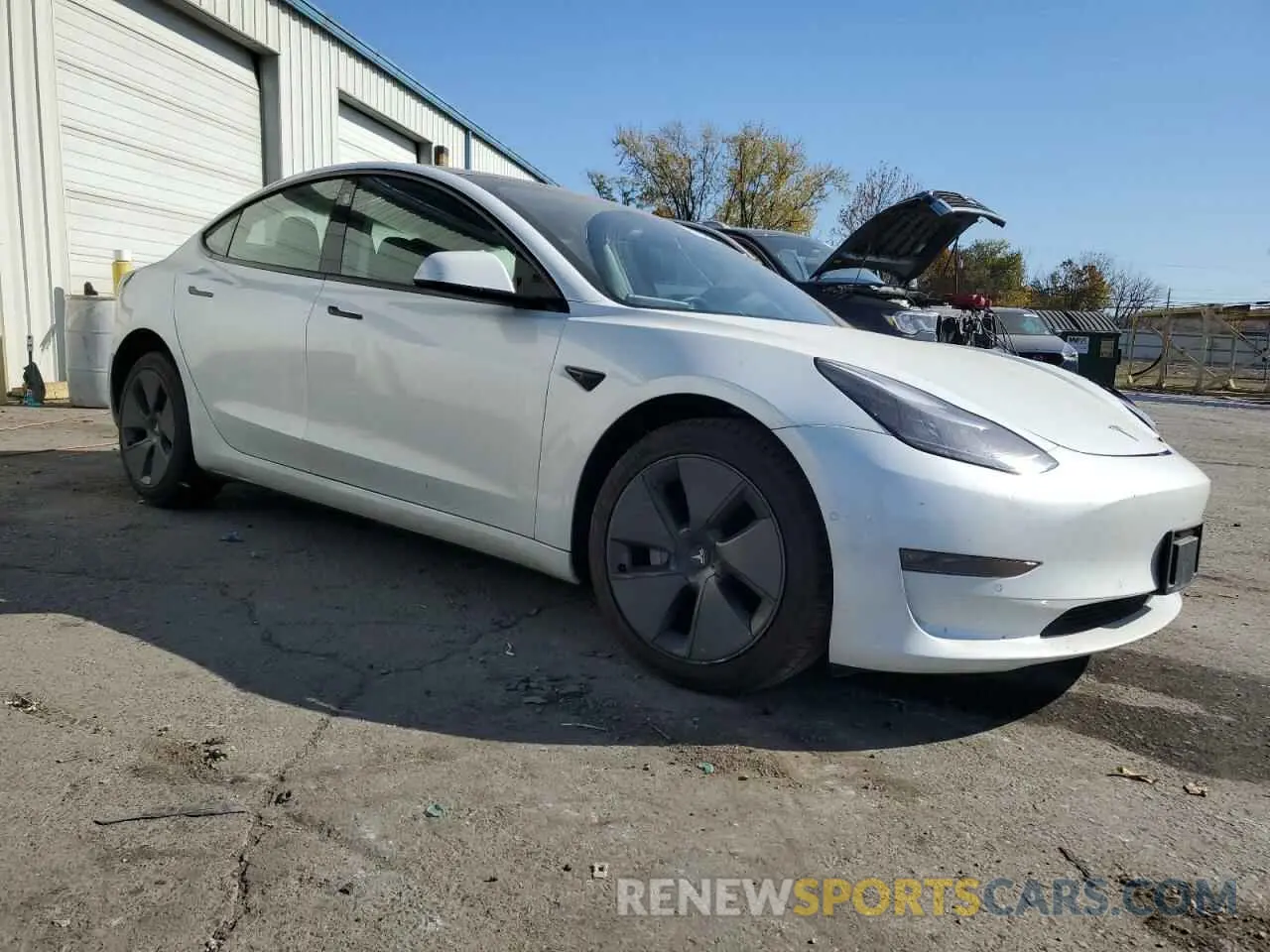 4 Photograph of a damaged car 5YJ3E1EB9MF869685 TESLA MODEL 3 2021