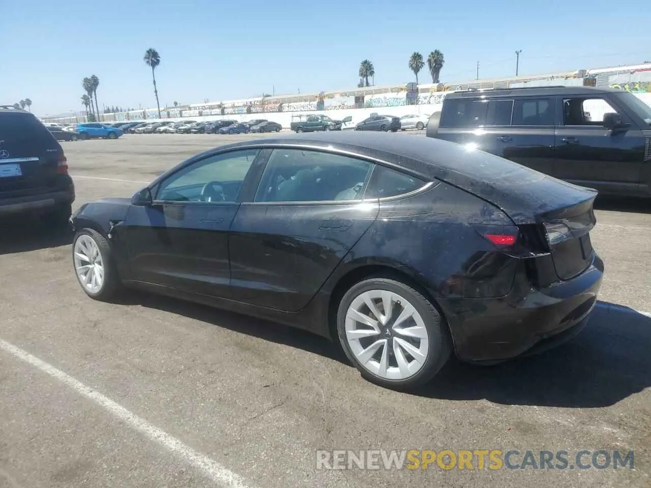 2 Photograph of a damaged car 5YJ3E1EB9MF877348 TESLA MODEL 3 2021