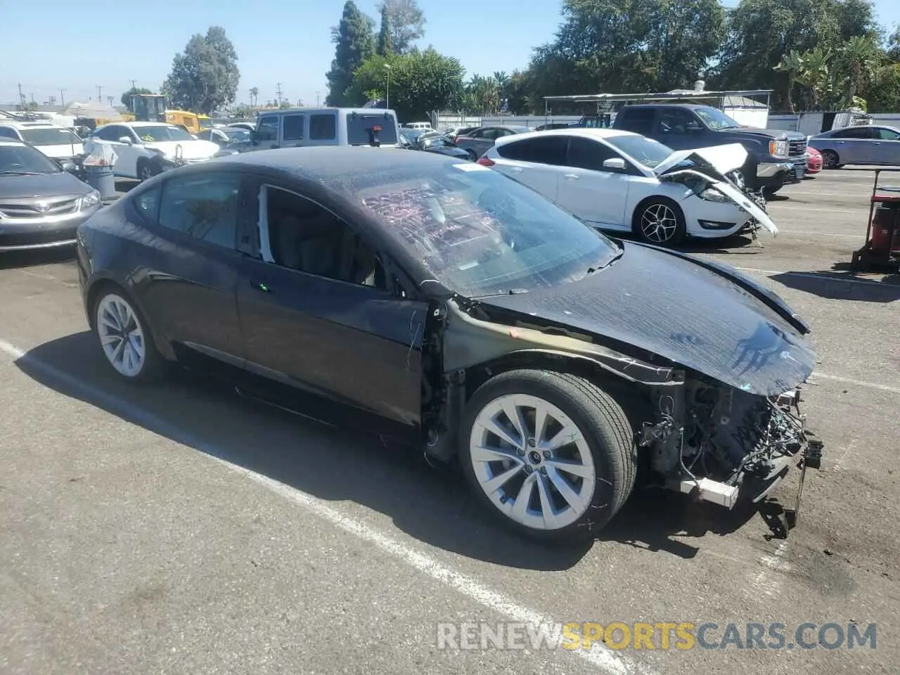 4 Photograph of a damaged car 5YJ3E1EB9MF877348 TESLA MODEL 3 2021