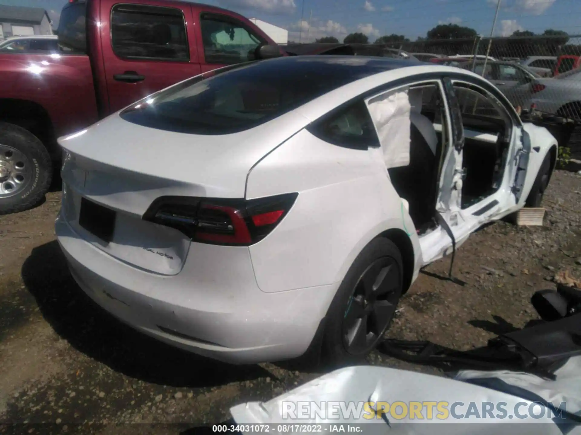 4 Photograph of a damaged car 5YJ3E1EB9MF913748 TESLA MODEL 3 2021