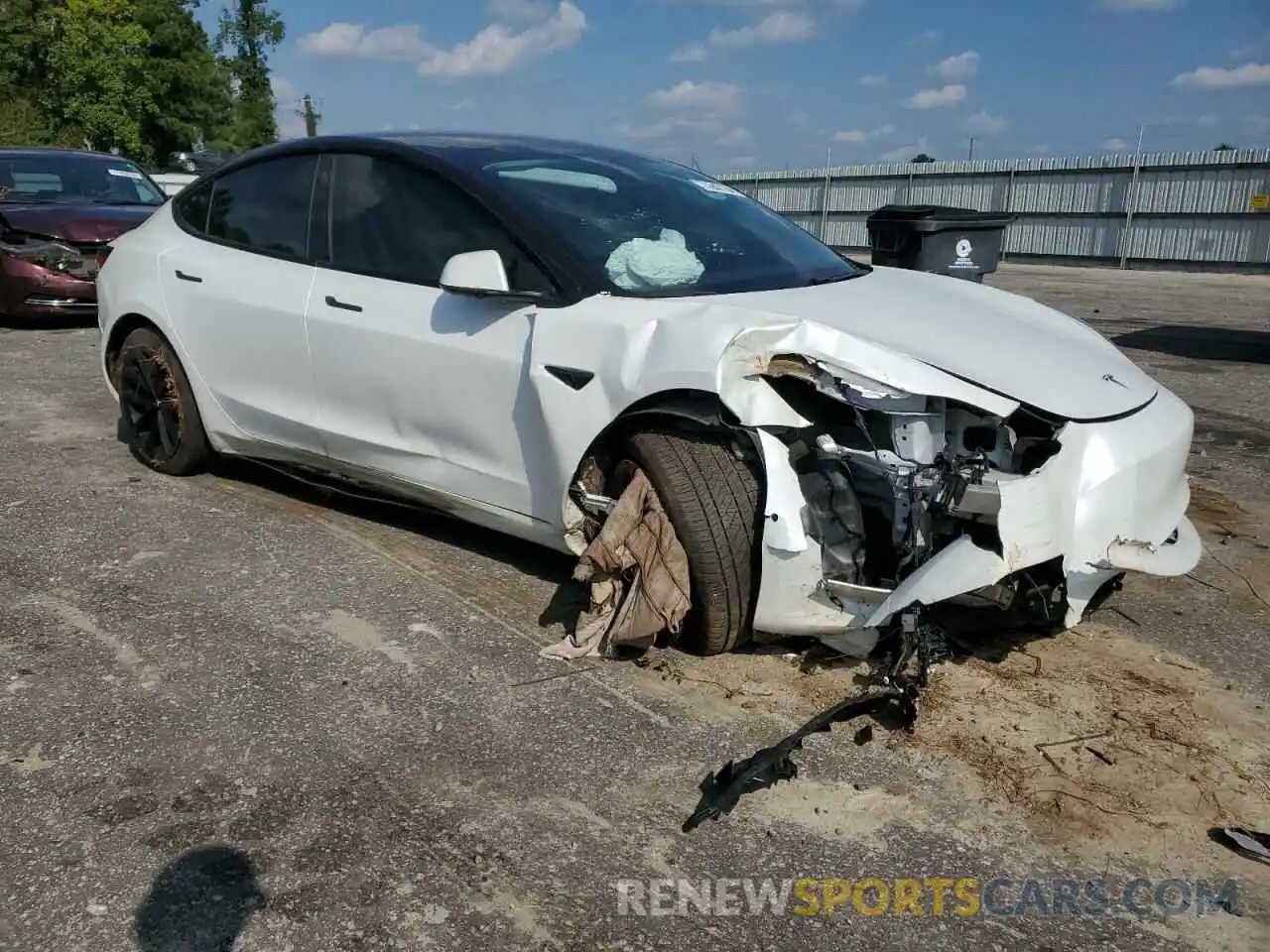 4 Photograph of a damaged car 5YJ3E1EB9MF923793 TESLA MODEL 3 2021