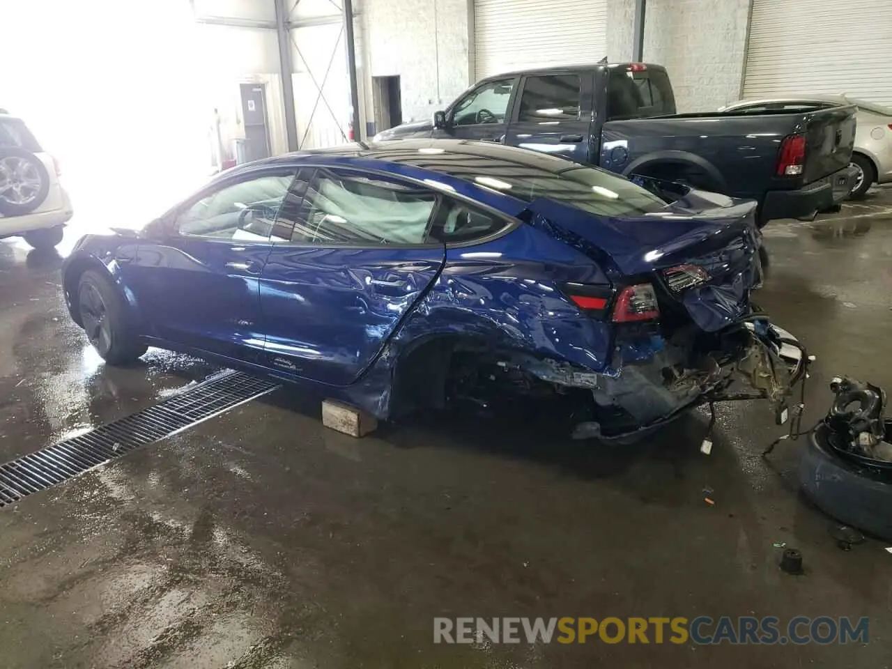 2 Photograph of a damaged car 5YJ3E1EB9MF927990 TESLA MODEL 3 2021