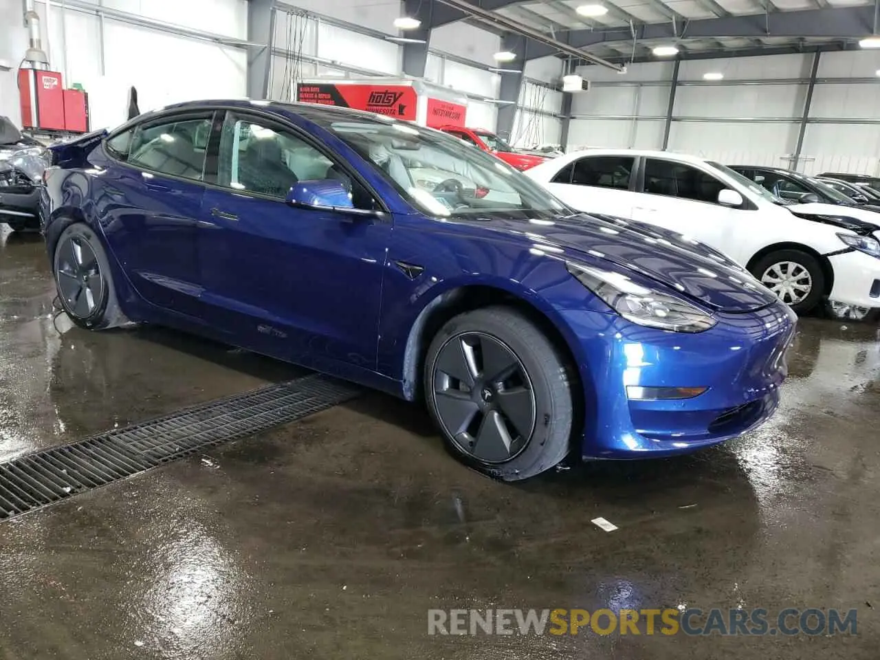 4 Photograph of a damaged car 5YJ3E1EB9MF927990 TESLA MODEL 3 2021