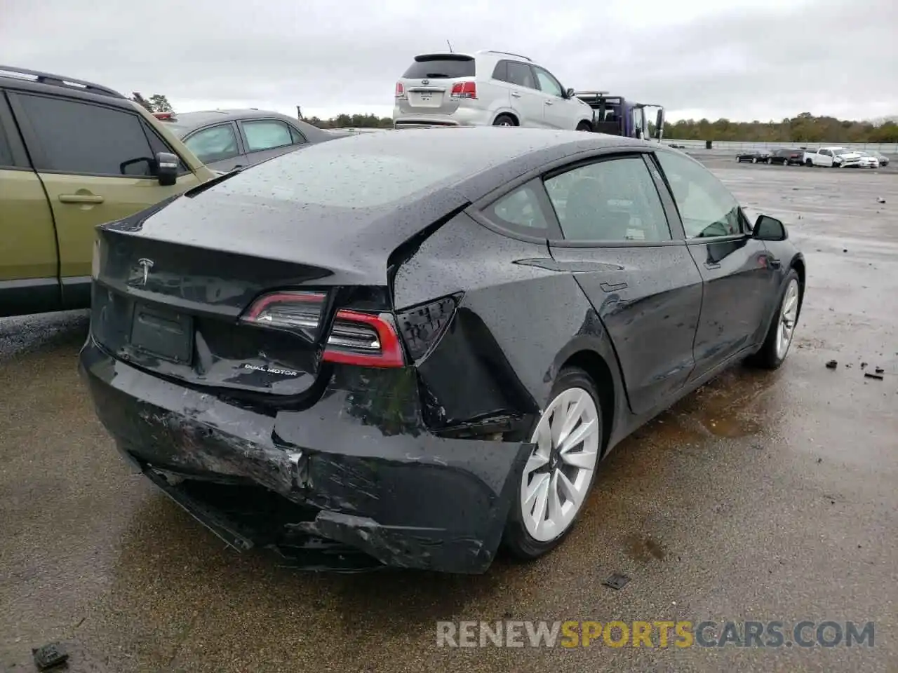 4 Photograph of a damaged car 5YJ3E1EB9MF974999 TESLA MODEL 3 2021