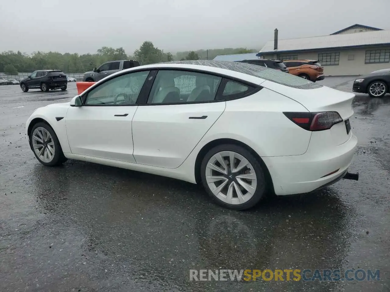 2 Photograph of a damaged car 5YJ3E1EB9MF975490 TESLA MODEL 3 2021