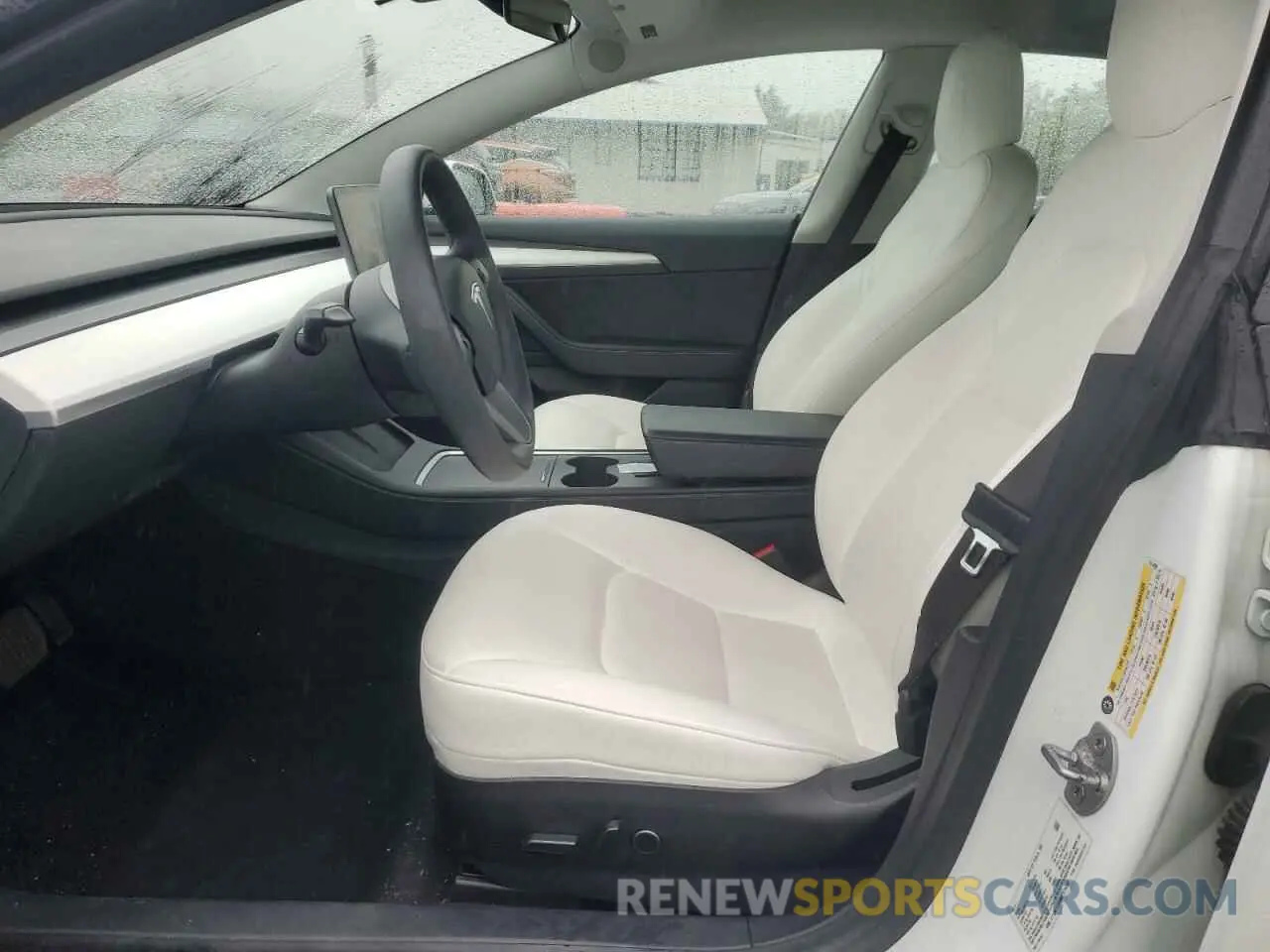 7 Photograph of a damaged car 5YJ3E1EB9MF975490 TESLA MODEL 3 2021