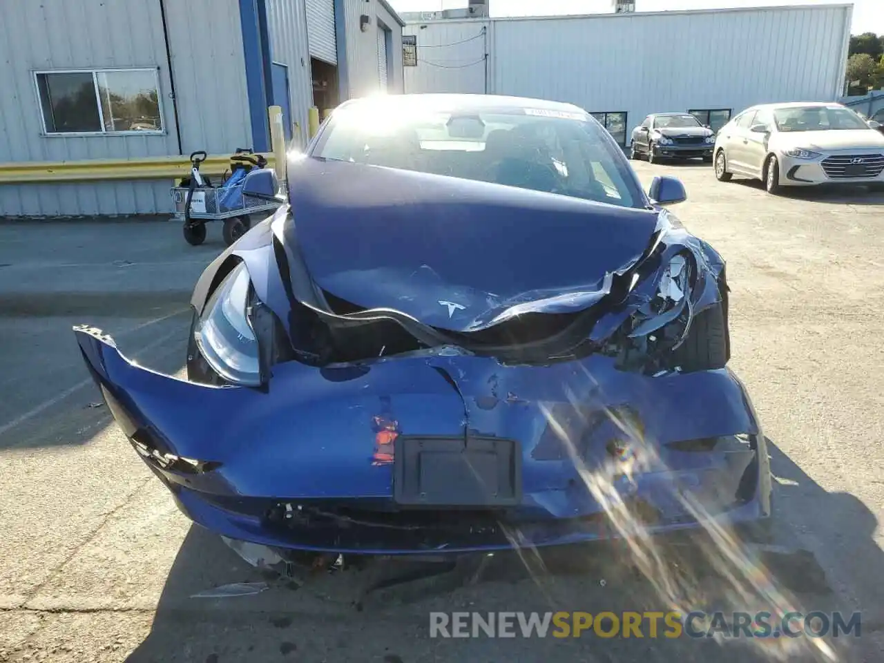 5 Photograph of a damaged car 5YJ3E1EB9MF995738 TESLA MODEL 3 2021