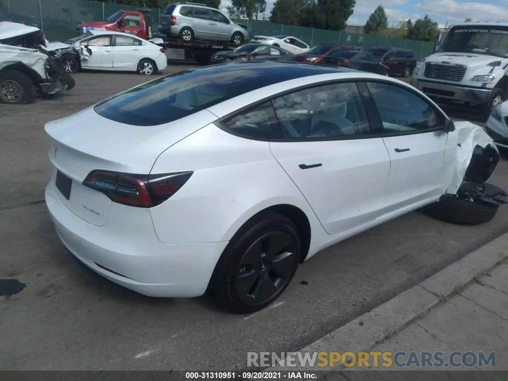 4 Photograph of a damaged car 5YJ3E1EBXMF037207 TESLA MODEL 3 2021