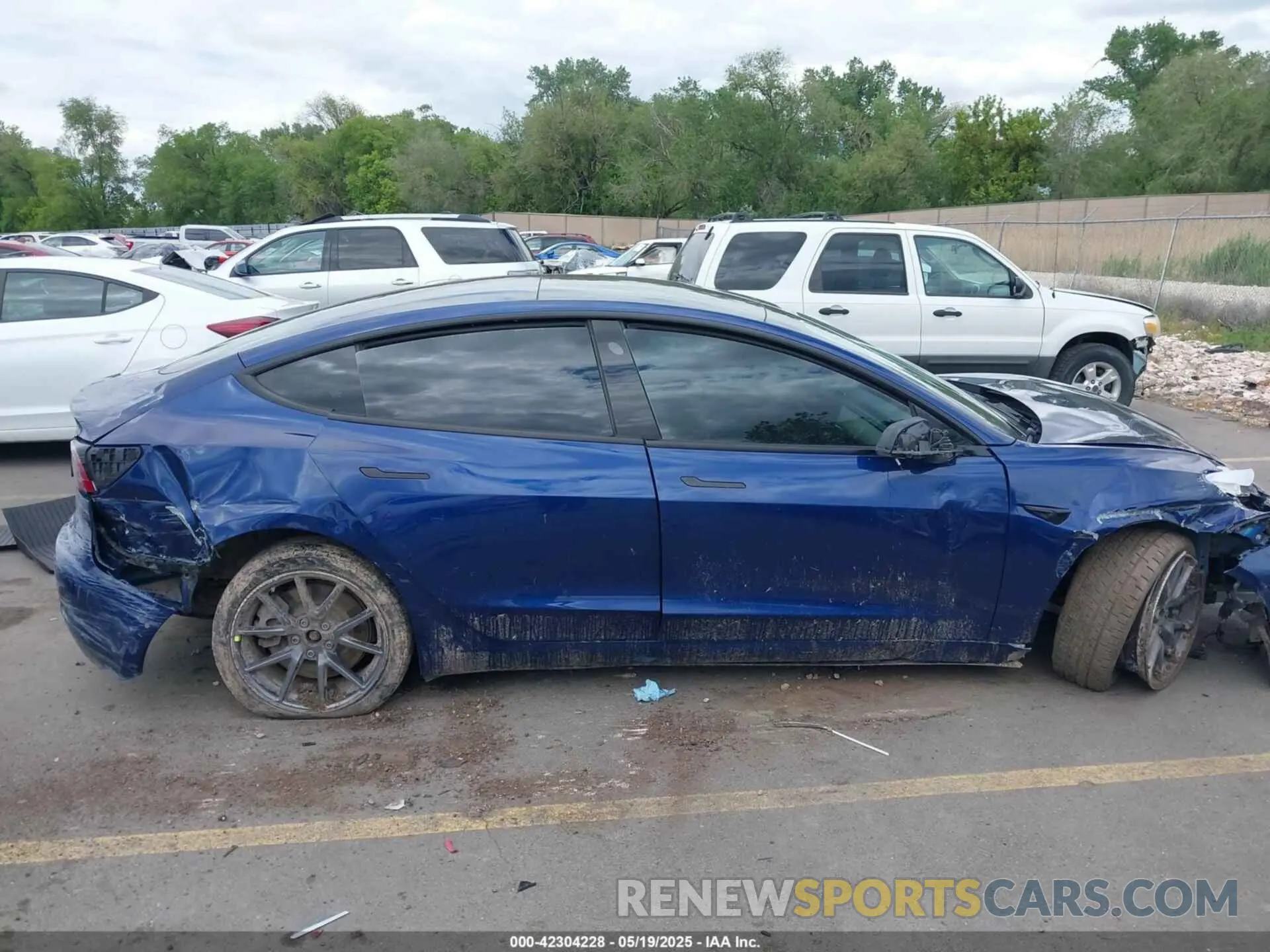 12 Photograph of a damaged car 5YJ3E1EBXMF054945 TESLA MODEL 3 2021