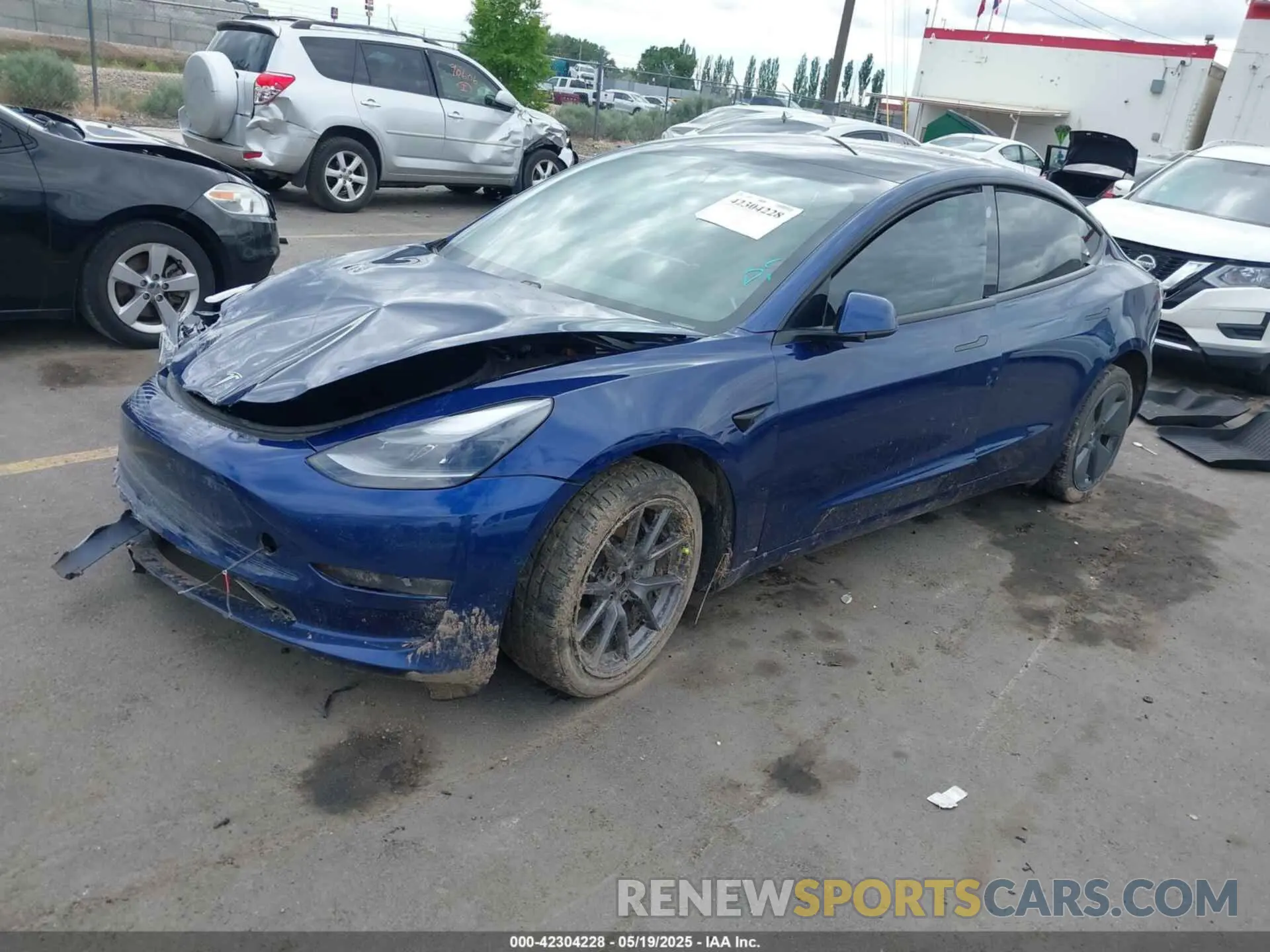 2 Photograph of a damaged car 5YJ3E1EBXMF054945 TESLA MODEL 3 2021