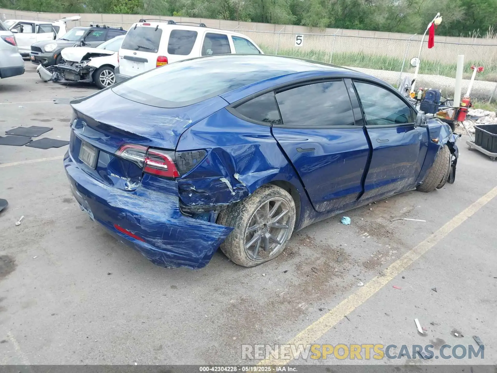 4 Photograph of a damaged car 5YJ3E1EBXMF054945 TESLA MODEL 3 2021