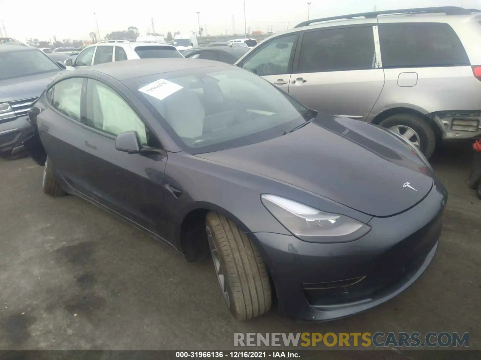 1 Photograph of a damaged car 5YJ3E1EBXMF074483 TESLA MODEL 3 2021