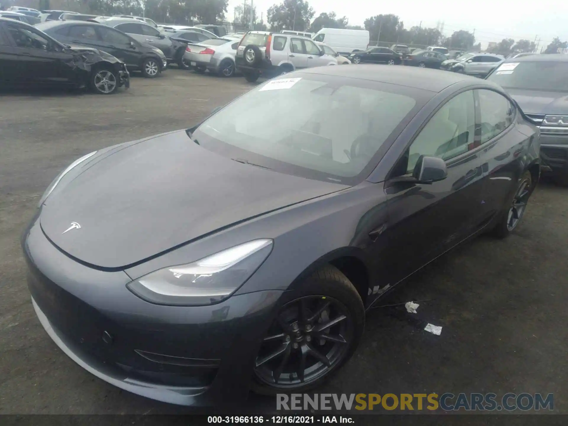 2 Photograph of a damaged car 5YJ3E1EBXMF074483 TESLA MODEL 3 2021