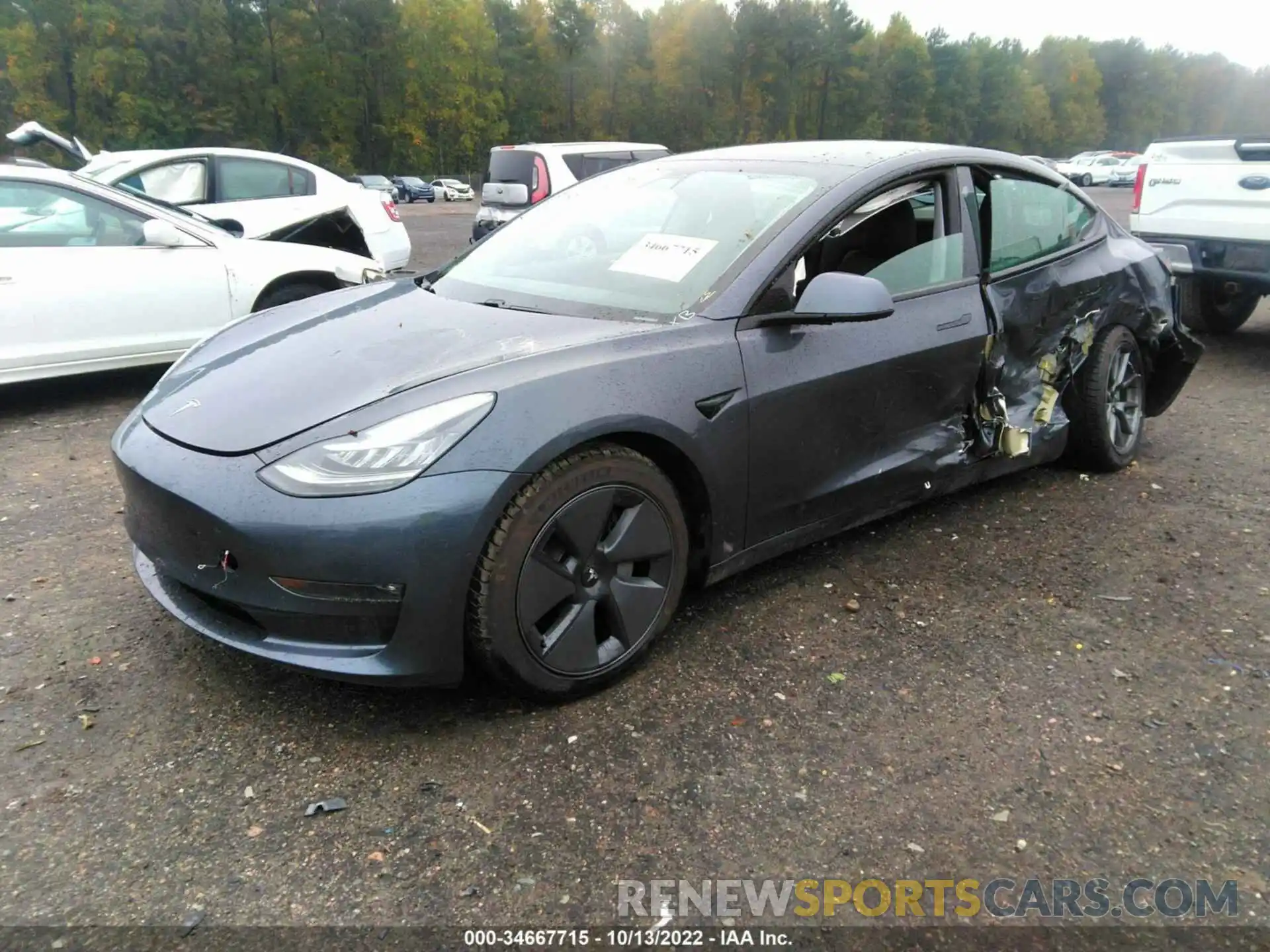 2 Photograph of a damaged car 5YJ3E1EBXMF853091 TESLA MODEL 3 2021