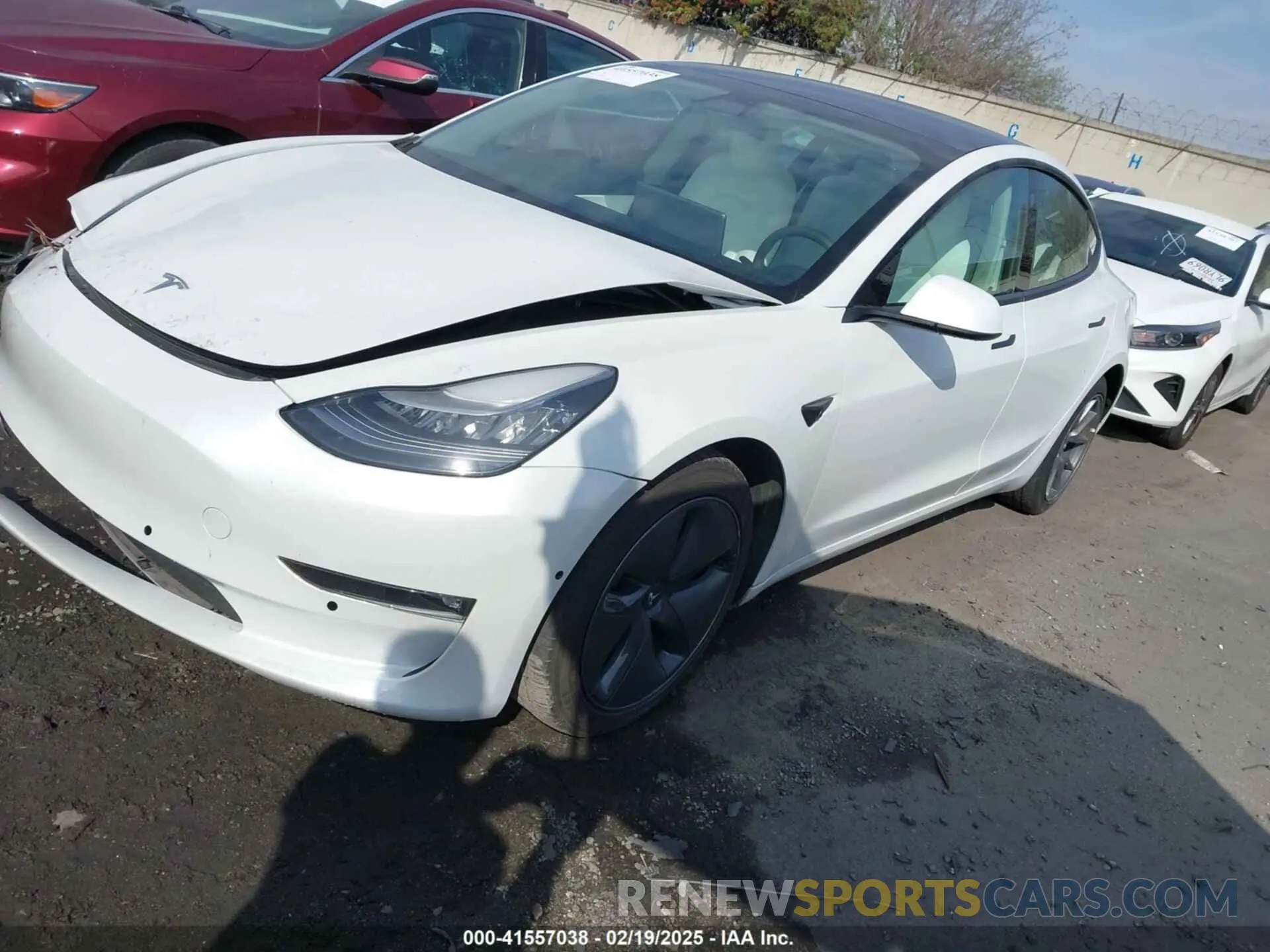 2 Photograph of a damaged car 5YJ3E1EBXMF860283 TESLA MODEL 3 2021