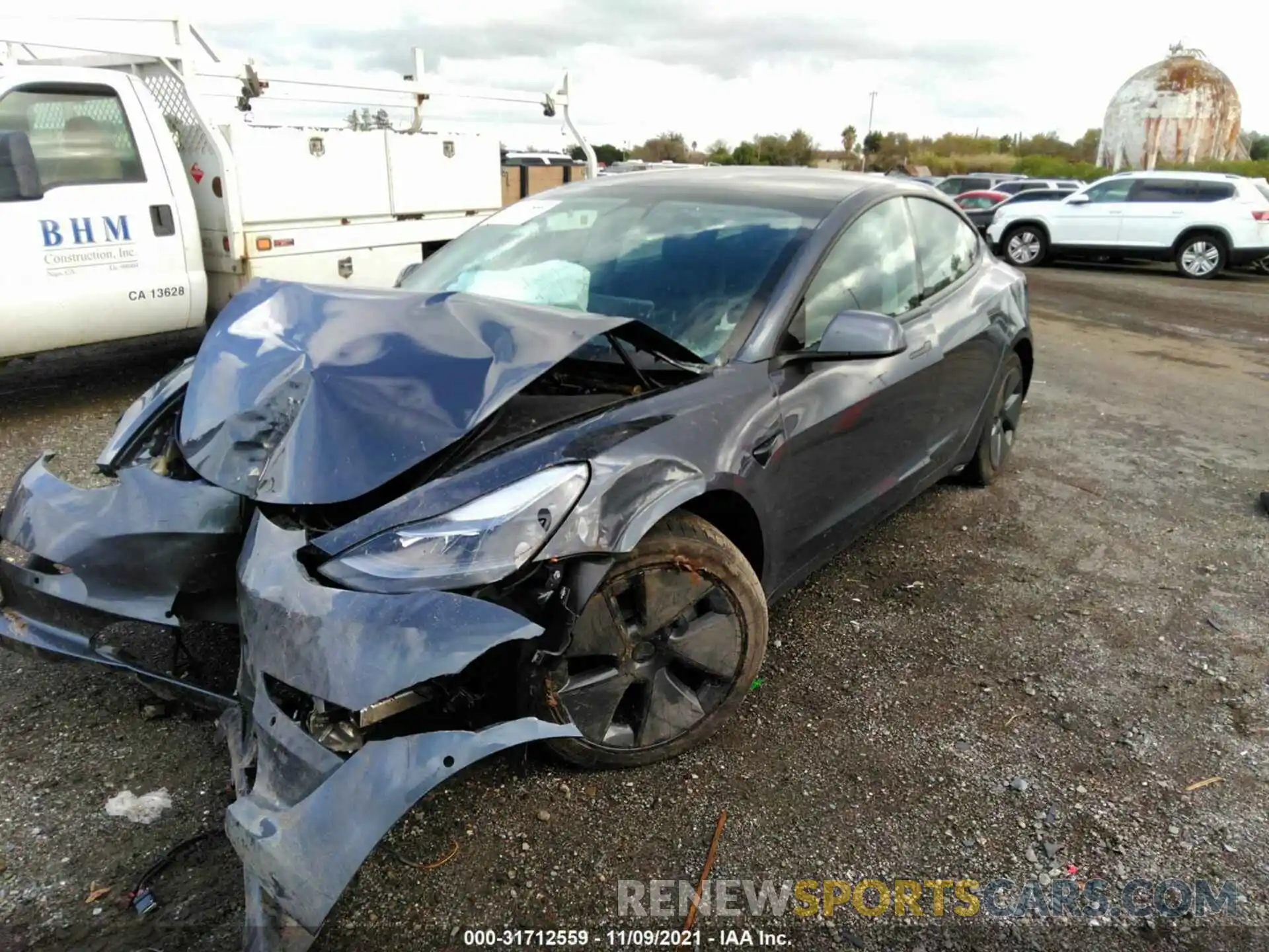 2 Photograph of a damaged car 5YJ3E1EBXMF874913 TESLA MODEL 3 2021